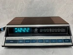 Vintage General Electric 7-4662B Am/fm Clock Radio Touch Control Woodgrain. Fixed Price $40.00.