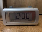 Brookstone Timesmart Self Setting Digital Dual Alarm Clock Model 4510. Fixed Price $34.99.