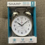 Sharp Quartz Model SPC800 Alarm Clock Silver Tone Twin Bells (bad Box). Fixed Price $17.58.
