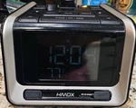 Hmdx Digital Clock Radio W/ Projector, Dual Alarm, Snooze, Sleep Timer Black. Fixed Price $10.00.