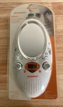 Sylvania SRS55 Sports Series Shower Clock Radio (factory Sealed). Fixed Price $25.00.