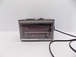 General Electric Vintage Wood Teak Radio Alarm Clock Model 7-4620D. Fixed Price $15.00.