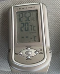 The Sharper Image Time And Temperature Alarm Clock Model Number ET258. Fixed Price $10.00.