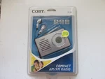 Coby CX-50 Compact Am/fm Radio With Headphones, Sealed!. Fixed Price $14.95.