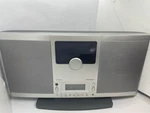 Brookstone SLCDV2.0 Player Am/ Fm Clock Radio Stereo No Remote. Fixed Price $55.00.