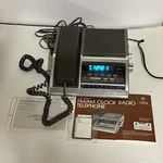 Vintage 7-4735 Fm/am Clock Radio Telephone Woodgrain W/ Box Manual Works. Fixed Price $174.99.