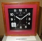 Seiko - Square Wood Trim With Red Beep Alarm Clock QXE047RLH. Fixed Price $60.00.