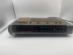 Vintage Am/fm Radio Alarm Clock Wood Grain Model 7-4636B Tested Works. Fixed Price $17.95.