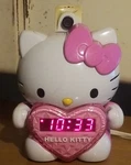 Hello Kitty KT2064P Projection Alarm Clock Radio Pink Heart Am/fm Tested Working. Fixed Price $20.95.
