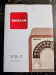 Sangean WR-15 Hi-fi Table Top Radio Fm/am Deep Bass Aux Input Glossy Silver. Fixed Price $599.95.