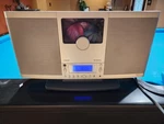 Brookstone Am Fm Player SLCDV2.0 Tested Working Needs Help Opening. Fixed Price $24.00.