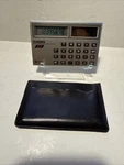 Casio Electronic Calculator Solar Cell SL-702C + Wallet Case Credit Card Size Vt. Fixed Price $9.95.
