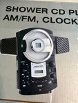 Model CD161 Player Shower Radio With Alarm Clock Nib (black). Fixed Price $55.00.