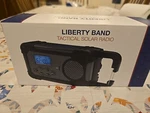 New 4PATRIOTS Liberty Band Tactical Emergency Solar Radio Flashlight. Fixed Price $30.00.