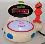 Sesame Street Elmo Alarm Clock Night Light Giggles Vibrates English Or Spanish. Fixed Price $19.45.