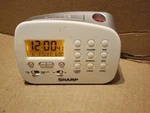 Sharp SPC570 Projection Alarm Digital Clock W/9 Nature Sounds Month/day/date. Fixed Price $45.00.