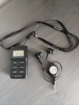 Dreamsky Portable Am/fm Radio Pocket Player With Belt Clip + Earbuds. Fixed Price $26.00.