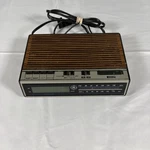 Vintage Digital Am/fm Clock Radio Woodgrain Model 7-4618B Tested Works. Fixed Price $29.99.