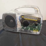 Freeplay Am/fm Radio, Clear, Solar Power, Wind-up, Transparent, No Antenna. Fixed Price $17.00.
