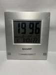 Sharp Digital Alarm Clock Lcd Temp Calendar Desk Wall Snooze Tested Working. Fixed Price $17.99.