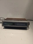 Vintage General Electric 7-4655A Am/fm Alarm Clock Radio Wood Grain (tested). Fixed Price $14.00.