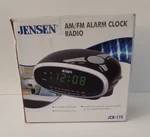 New Jensen Black Am/fm Alarm Clock Radio Green Led Display Auxiliary Input MP3. Fixed Price $19.99.