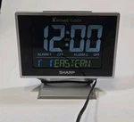 Sharp SPC585 Atomic Desktop Alarm Clock Silver Led Digital Dual Works. Fixed Price $23.75.