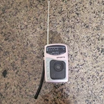 Lenoxx Sound PR-35M Am/fm Sports Radio Pink Gray Wrist Strap. Fixed Price $7.99.