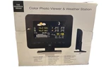 Color Photo Viewer & Weather Station By Sharper Image Brand New Never Opened. Fixed Price $39.00.