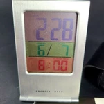 Sharper Image Three-color Lcd Travel Alarm Clock SF002 # 9689 U. Fixed Price $7.95.