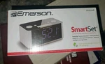 Emerson Smart Set Fm Radio Alarm Clock Blue Display Model CKS1708. Fixed Price $19.95.