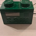 Lego Green Digital Clock Radio Alarm Am/fm Snooze Backlight Modern Plastic. Fixed Price $28.00.