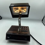 Vintage Cosmo Time Alarm Clock And High Intensity Light Model 5501 Brown. Fixed Price $17.90.