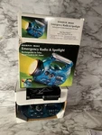 Sharper Image Emergency Radio & Spotlight Flashlight Rechargeable. Fixed Price $18.99.