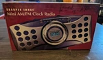 Sharper Image Mini Digital Am/fm Clock Radio Alarm GM107 # 9821 New Sealed. Fixed Price $25.59.