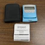 Oregon Scientific Self-setting Atomic Travel Alarm Clock W/ Case Blue. Fixed Price $24.95.