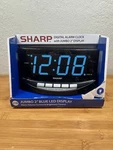 Sharp Easy To See Alarm Clock With Jumbo 2 Numbers - Bright Blue Led Display. Fixed Price $25.00.