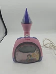 Disney Princess Castle Alarm Clock Radio Pink Purple Starlight DCR4500P Tested. Fixed Price $33.24.