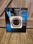 Vintage Skyscan Projection Atomic Clock Cube Radio New Package Model 31402. Fixed Price $139.44.