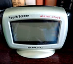 Ultronic Portable Alarm Clock Touch Screen Thermo TD00552 Battery Powered Nib. Fixed Price $9.98.