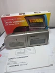 Sharper Image Travel Companion Plus Alarm, Flashlight SI500. Fixed Price $12.95.