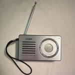 Coby CX-50 Am/fm Portable Radio W/ Digital Display, Headphone Jack Silver. Fixed Price $10.00.
