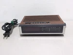 Lloyds Model # J202B Am/fm Alarm Clock Radio Electric Digital Mcm Woodgrain. Fixed Price $27.50.