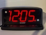 Sharp SPC1225 Digital Alarm Clock Tested Works Night Light Does Not. Fixed Price $18.39.