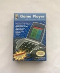 Innovage 2007 Portable Game Player With Calculator Alarm Clock Handheld. Fixed Price $11.00.