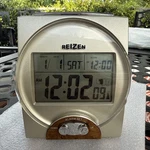 Reizen Talking Atomic Alarm Clock Calendar Gold W/ Wood Accents Battery Operated. Fixed Price $26.99.