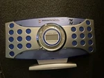 Sharper Image Mini Digital Am/fm Clock Radio Alarm GM107. Fixed Price $8.00.