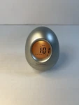 Brookstone Bob Silver Oval Egg Wobble Clock 5-IN-1 Alarm Date Timer Temp Travel. Fixed Price $11.07.