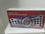 Sharper Image Mini Digital Am/fm Clock Radio Alarm GM107 New. Fixed Price $143.99.