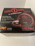 Sonic Bomb Wake Up Loud Alarm And Bed Shaker Clock - New In Box. Fixed Price $24.99.